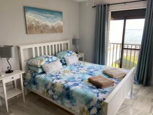 A bed or beds in a room at Casa Vista
