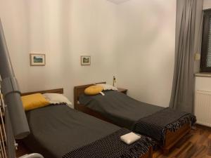 Postel nebo postele na pokoji v ubytování Apartament na Wzgórzu