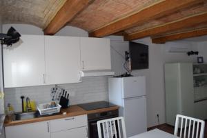 Kuchyň nebo kuchyňský kout v ubytování APARTMENTS SCIRENICA + 11 fotografií