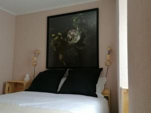 A bed or beds in a room at Casa Augusta - The Natural Lodgings And Retreats