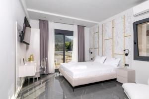 Posteľ alebo postele v izbe v ubytovaní B&D Luxury Suites