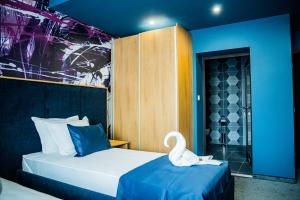 Katil atau katil-katil dalam bilik di Impuls hotel