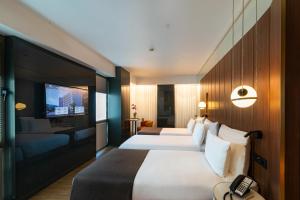 Postel nebo postele na pokoji v ubytování The Craton Hotel Sisli