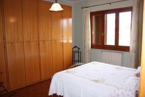 A bed or beds in a room at Tuscan Dream Casa Vacanze