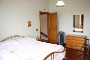 A bed or beds in a room at Tuscan Dream Casa Vacanze