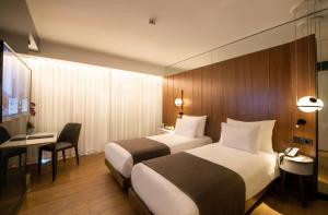 Postel nebo postele na pokoji v ubytování The Craton Hotel Sisli