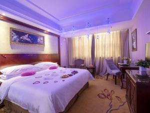 Cama ou camas em um quarto em Vienna Classic Hotel Danyang City Hall