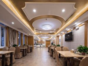 ห้องอาหารหรือที่รับประทานอาหารของ Vienna Hotel Jiangsu Changzhou Qingfeng Park