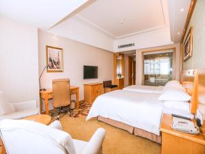 Μια τηλεόραση ή/και κέντρο ψυχαγωγίας στο Vienna Hotel Yingcheng Hai Mountain Yingcheng +8 φωτογραφίες