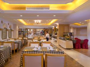 Restaurant o un lloc per menjar a Venus International Hotel Shenzhen Gongming Tianhong