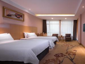 Fotografie z fotogalerie ubytování Vienna 3 Best Hotel Dongguan Liaobu Veicle City v destinaci Liaobu