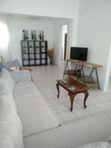 A television and/or entertainment centre at Pomegranate apartment