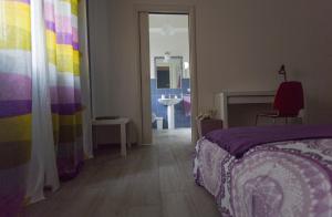 Posteľ alebo postele v izbe v ubytovaní Casa Di Amici