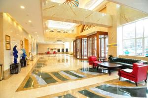Area lobi atau resepsionis di Vienna International Hotel Qinghai Xining Tianjun Bridge