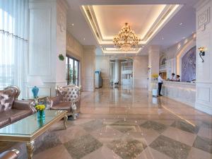 منطقة الاستقبال أو اللوبي في Vienna International Hotel Luogang Wanda Plaza
