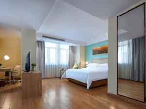 Katil atau katil-katil dalam bilik di Vienna Hotel (Dongmin Road Nanning)