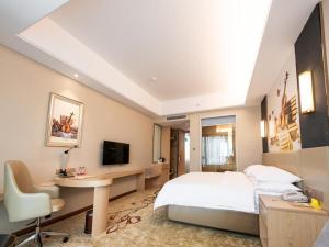 TV a/nebo společenská místnost v ubytování Vienna International Hotel (Changsha Ningxiang South Bus Station)