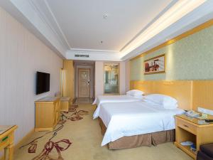 Μια τηλεόραση ή/και κέντρο ψυχαγωγίας στο Vienna Hotel Jiangsu Xuzhou Pengcheng Square