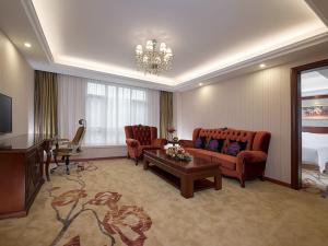 Posezení v ubytování Vienna Hotel Foshan Huangqi + 3 fotografie