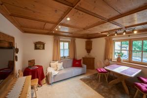 Postel nebo postele na pokoji v ubytování Saukaserstub'n Apartments - Ferienwohnung Schützkogel