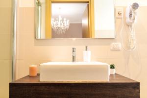 Vannituba majutusasutuses Arcobaleno Suites