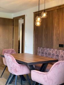 A seating area at Wood Apartments by Trendlbrugger
