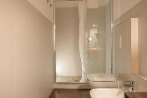 Vannituba majutusasutuses Arcobaleno Suites