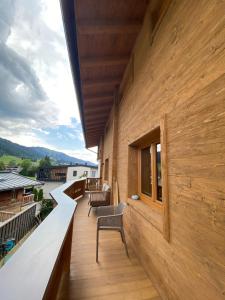 A balcony or terrace at Wood Apartments by Trendlbrugger