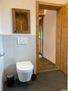 A bathroom at Wood Apartments by Trendlbrugger