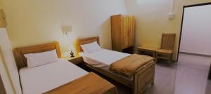 Letto o letti in una camera di Thyme Guest House