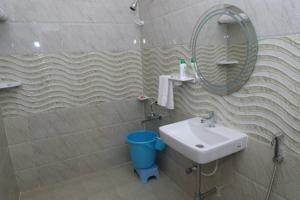 Koupelna v ubytování divine homestay tirupati villa + 6 fotografií