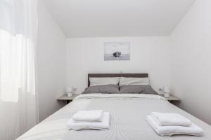 Postel nebo postele na pokoji v ubytování Apartment Sea Dream, Polje - Krk