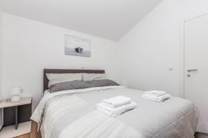Postel nebo postele na pokoji v ubytování Apartment Sea Dream, Polje - Krk