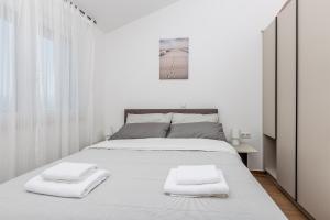 Postel nebo postele na pokoji v ubytování Apartment Sea Dream, Polje - Krk