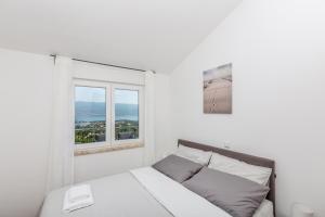 Postel nebo postele na pokoji v ubytování Apartment Sea Dream, Polje - Krk