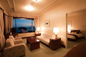 Katil atau katil-katil dalam bilik di Gamagori Classic Hotel