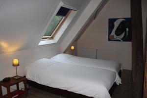 En eller flere senger på et rom på Wartena Hoeve - Vega B&B
