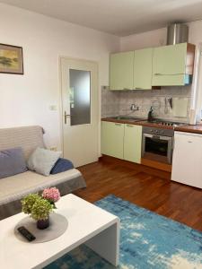 Kuchyň nebo kuchyňský kout v ubytování Goga Apartments