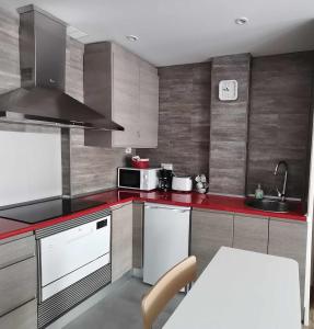 Kuchyňa alebo kuchynka v ubytovaní Apartamento Carreira Sada + 35 fotografií