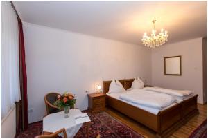 Ein Bett oder Betten in einem Zimmer der Unterkunft Hotel Gratkorn