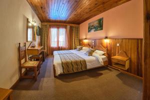 Postel nebo postele na pokoji v ubytování Hotel Victoria