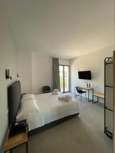 Letto o letti in una camera di Baglio Custera