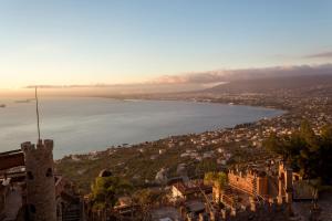 a view of a city and a body of water at Horizon Blu Boutique Hotel in Kalamata