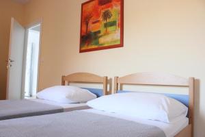 Postel nebo postele na pokoji v ubytování Apartment Luce