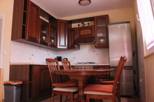 Kuchyň nebo kuchyňský kout v ubytování Apartment Luce