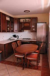 Kuchyň nebo kuchyňský kout v ubytování Apartment Luce + 25 fotografií