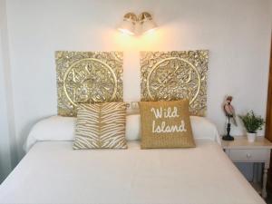 Postel nebo postele na pokoji v ubytování Apartamentos Ulia