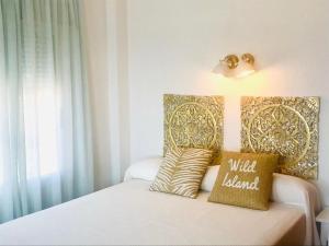 Postel nebo postele na pokoji v ubytování Apartamentos Ulia