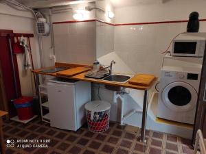 Kuchyňa alebo kuchynka v ubytovaní Mayor 17 Apartamento 1