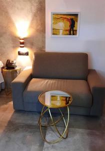Ein Sitzbereich in der Unterkunft HOTEL Boutique ÁNGEL